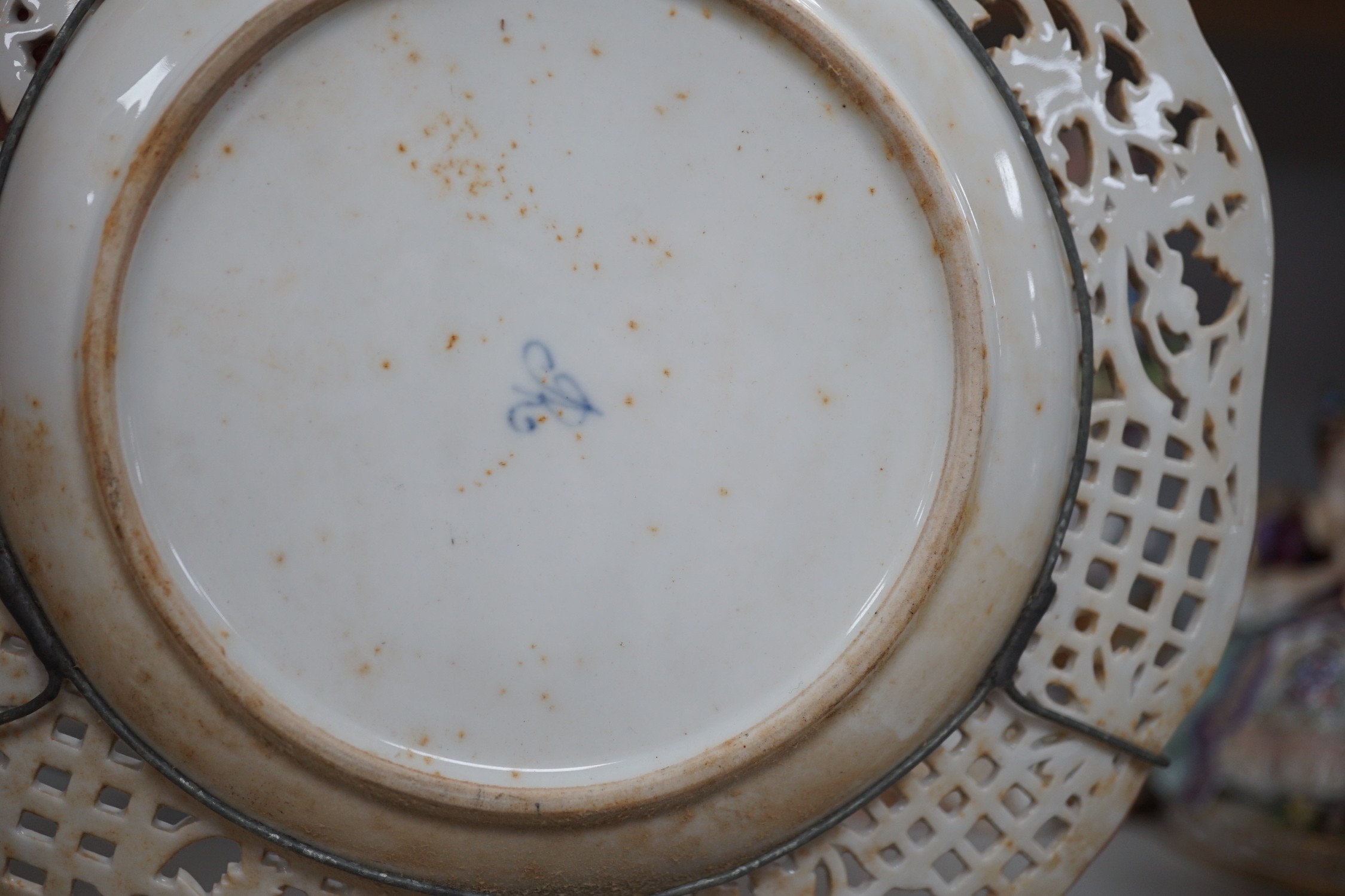 Two Meissen leaf dishes, a Dresden plate, two group figures and mixed ceramics, tallest 25cms high